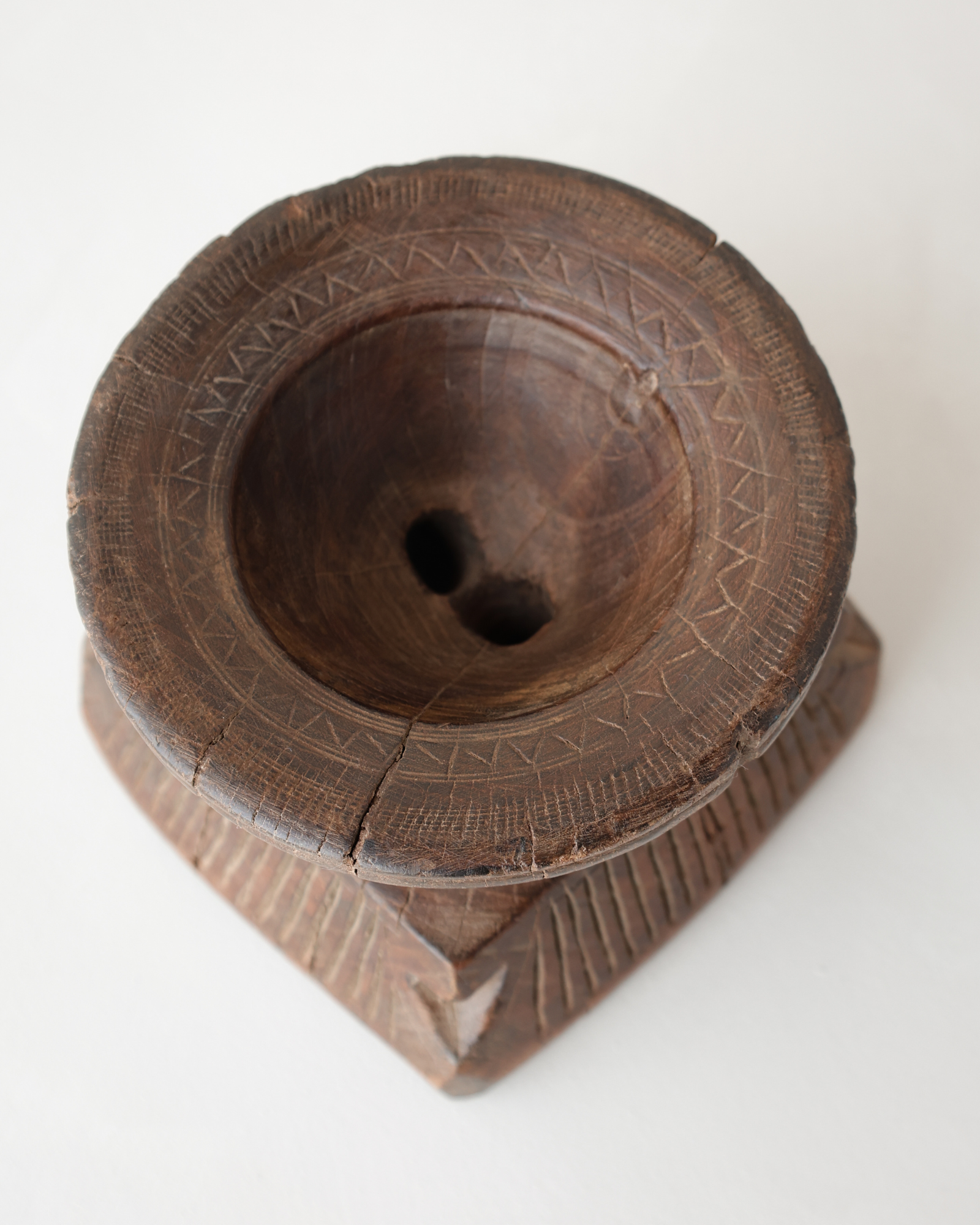 Hand carved wooden seeder